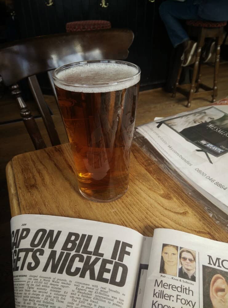 A well earned pint and a ready of the Sunday papers after the Richmond Half.